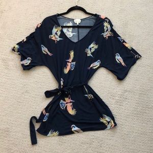 Anthropologie blue shirt with birds; ties at waist